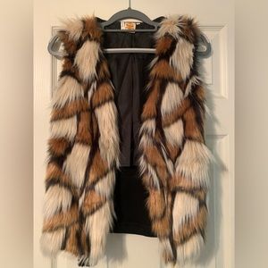Sleeveless vest Size Medium black lining with multi color faux fur.